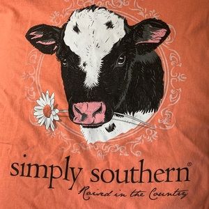 Salmon colored Simply Southern cow shirt medium